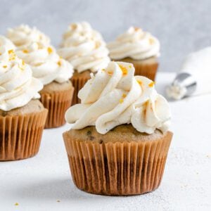 completed Blackberry Orange Cupcakes displayed on a white surface