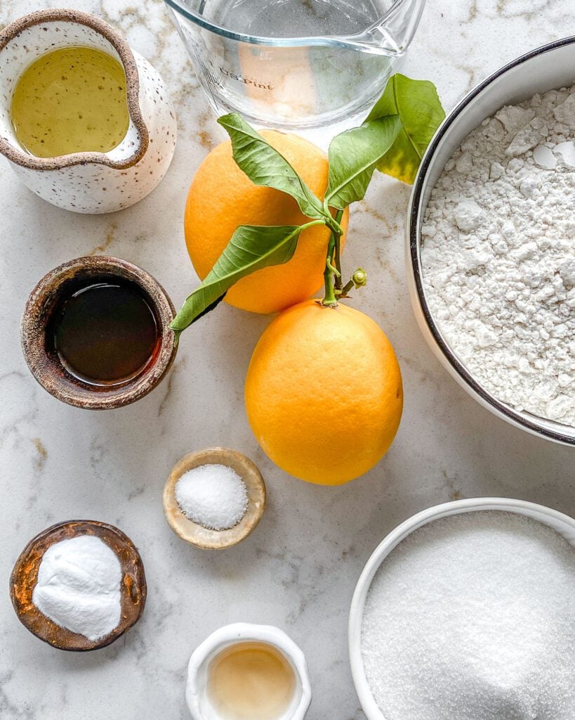 ingredients for Lemon Frosting Cake measured out against a white surface