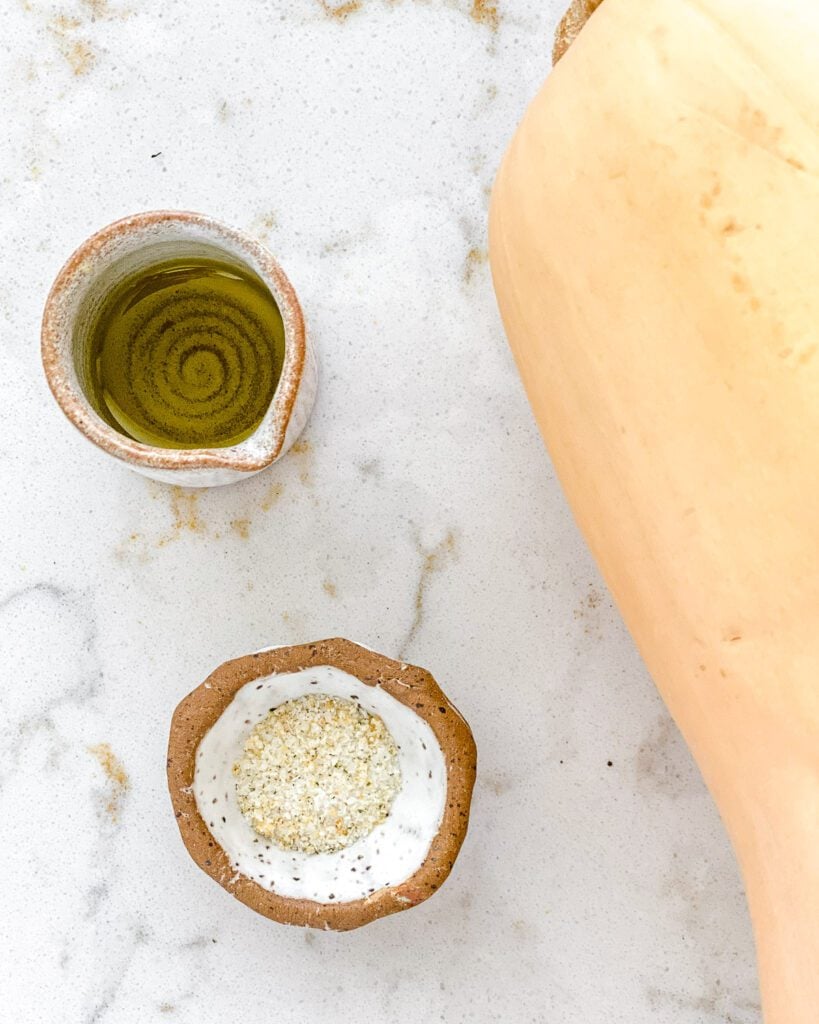 ingredients for air fryer butternut squash against a white surface