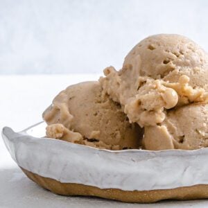 completed coffee banana nice cream in a white bowl against a white background