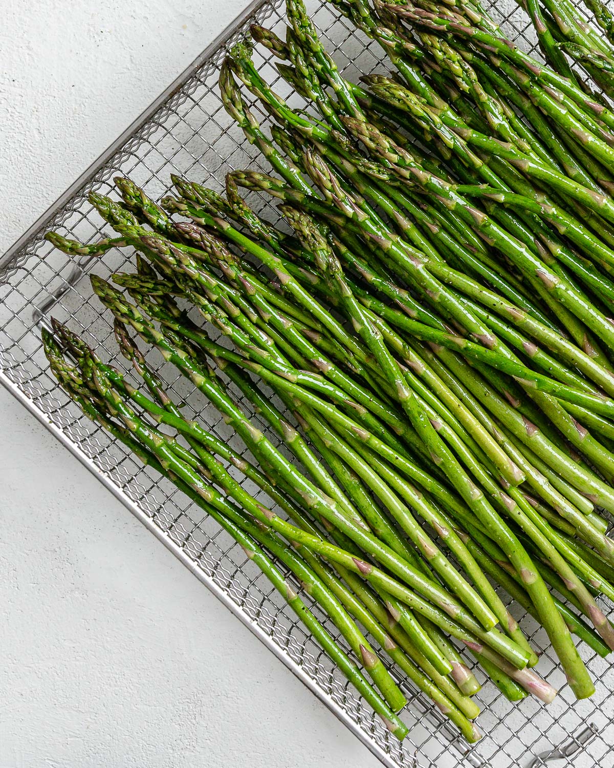 completed air fryer asparagus on a wire rack