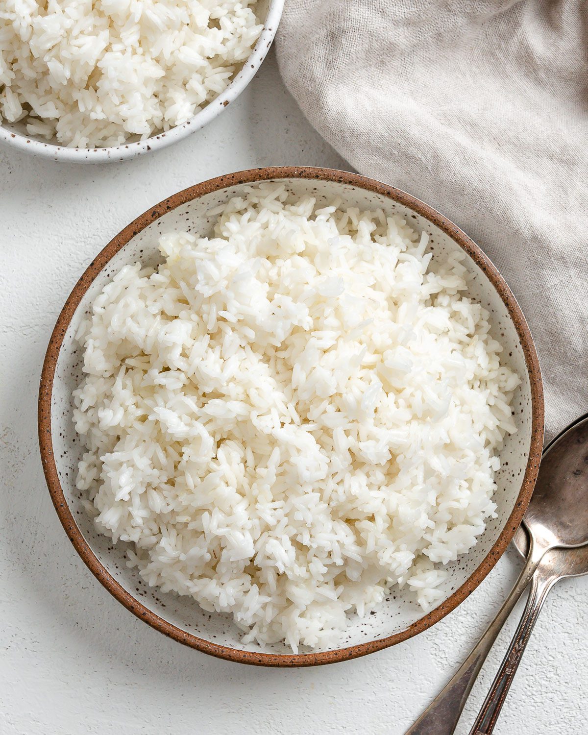completed bowl of instant pot jasmine rice against a light surface