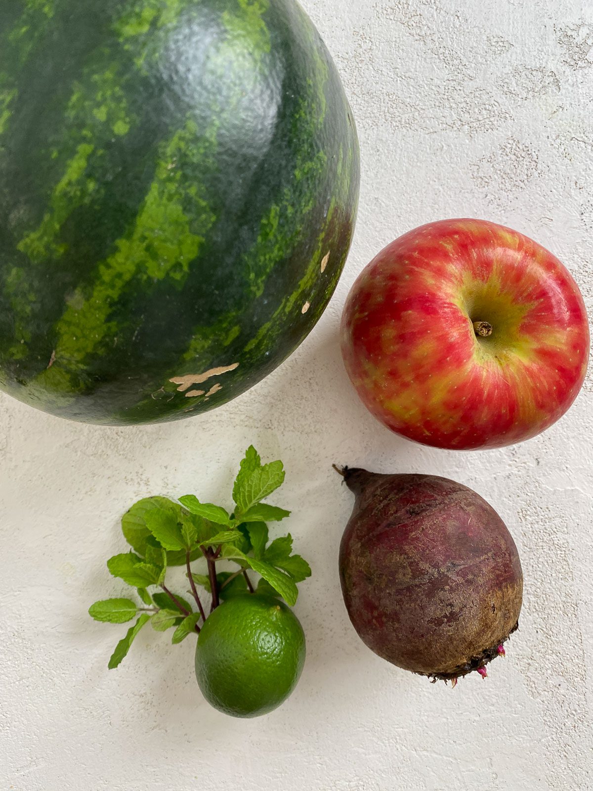 ingredients for Fresh Watermelon Juice Blend against a light background