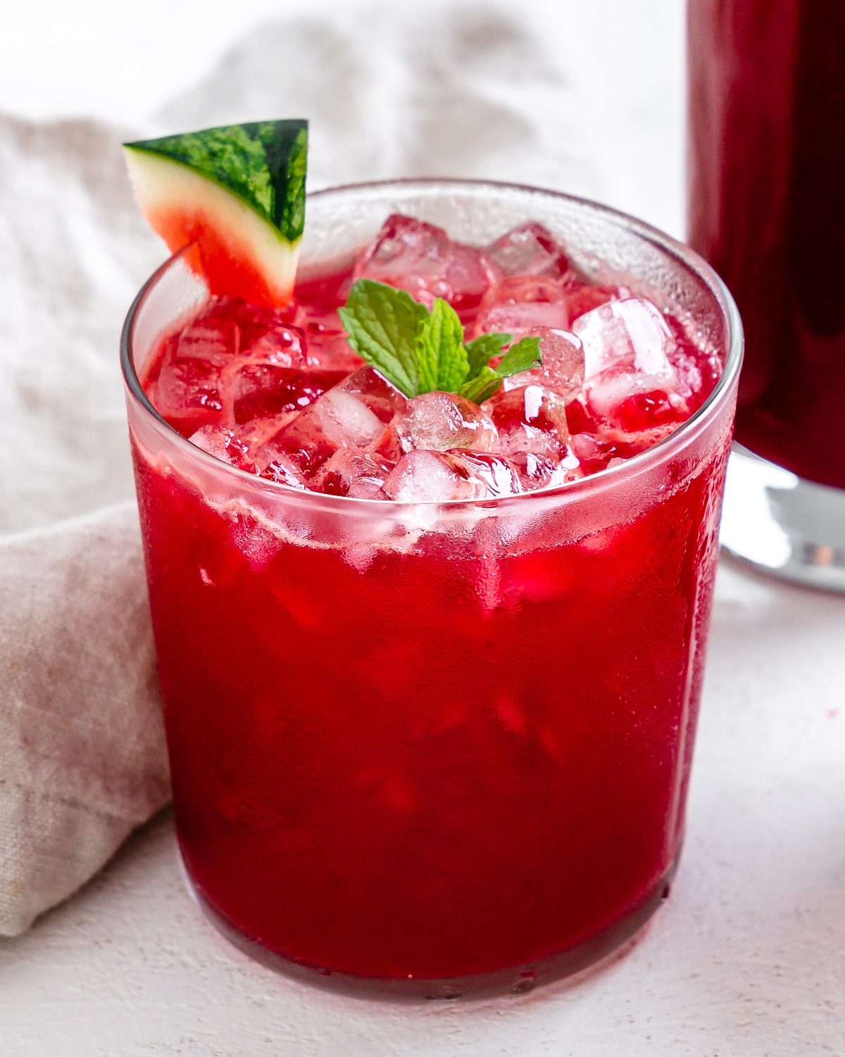 completed Fresh Watermelon Juice Blend in a glass cut with another cup in the background