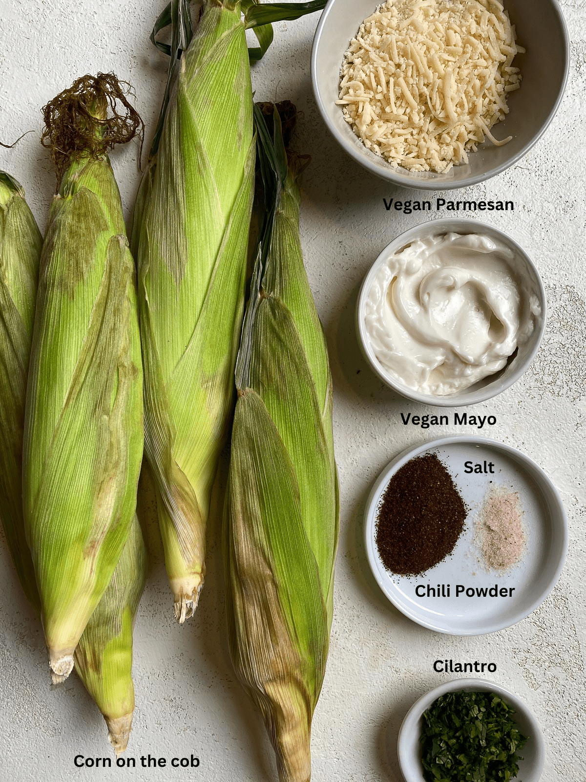 Ingredients for Vegan Elote measured out on a white surface.