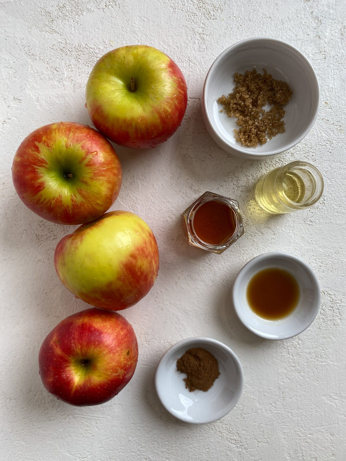ingredients for Air Fryer Apples measured out against a white surface