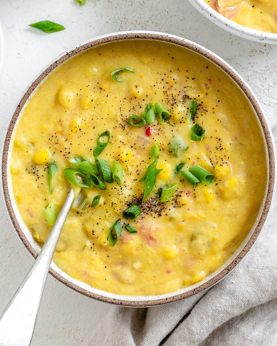 completed Vegan Corn Chowder in a bowl against a white background