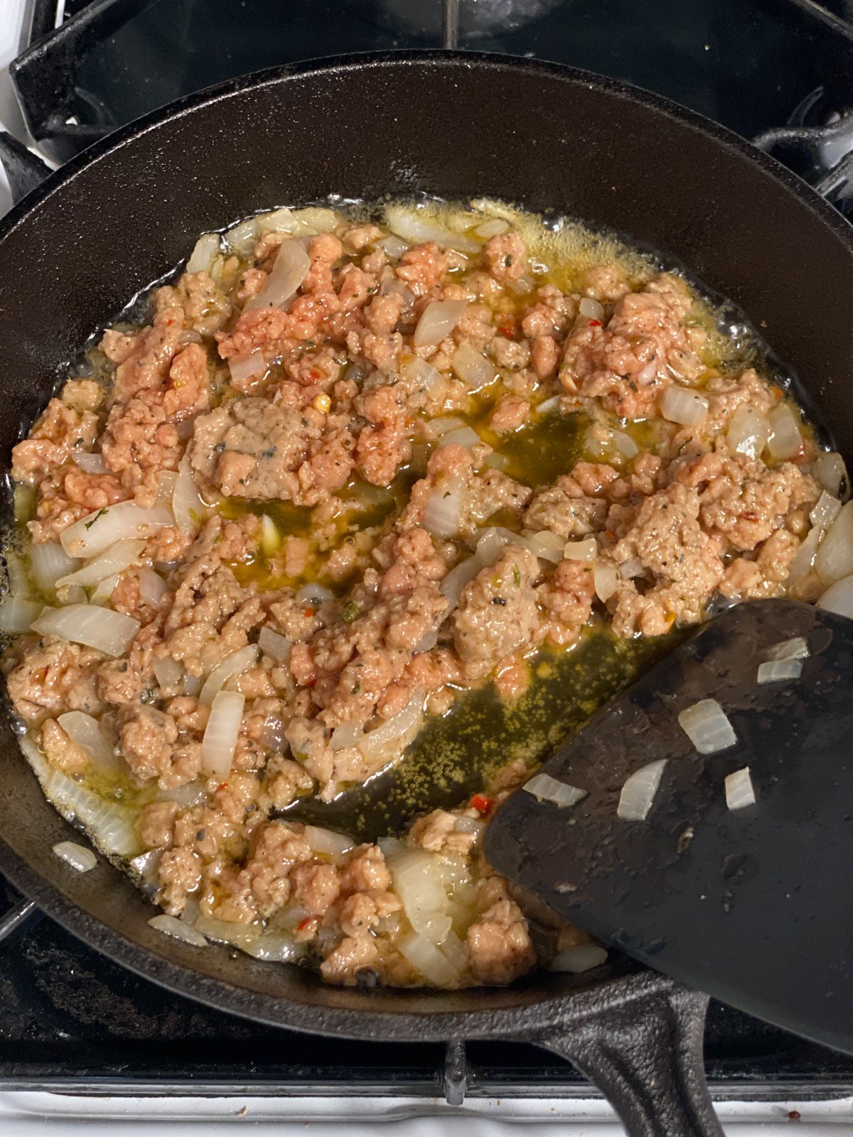 process shot of ingredients being mixed together in a pan