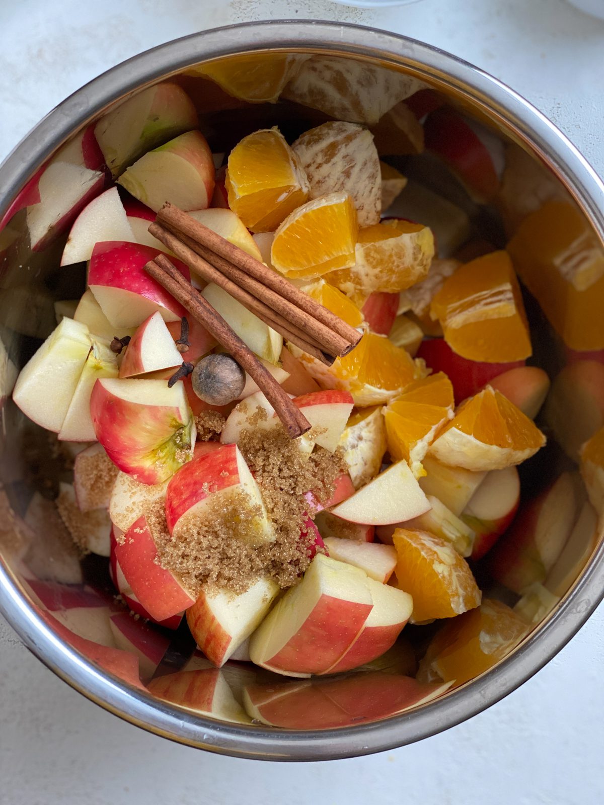 all ingredients for Vegan Instant Pot Apple Cider in an instant pot