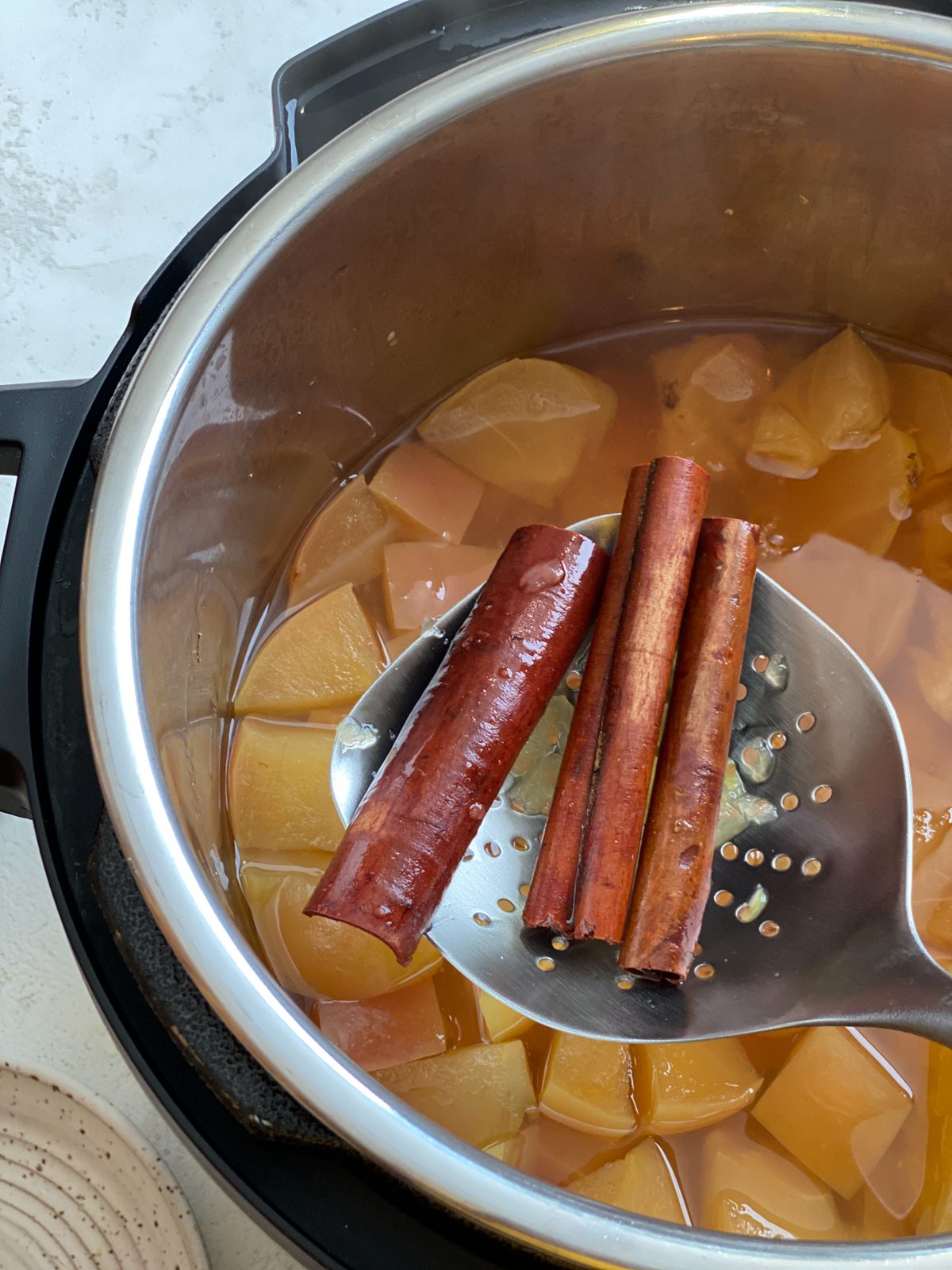 the process of removing cinnamon sticks from instant pot