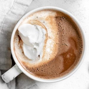 completed Dairy-Free Peppermint Hot Chocolate in a white mug against a light surface