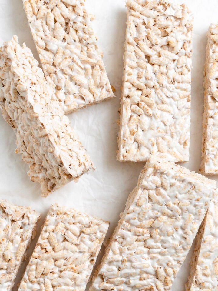 completed Easy Vegan Rice Krispie Treats scattered on a white surface
