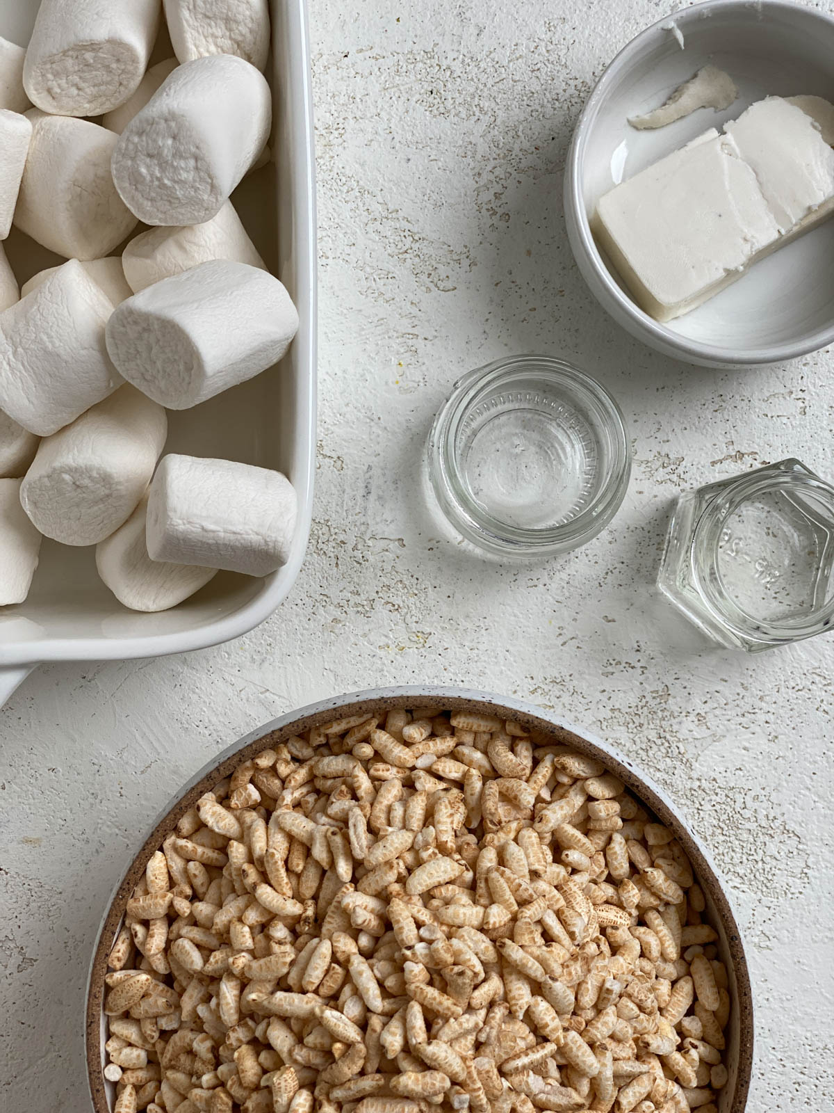 ingredients for Easy Vegan Rice Krispie Treats spread out on a white surface
