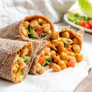 completed Buffalo Chickpea Wraps on a white surface