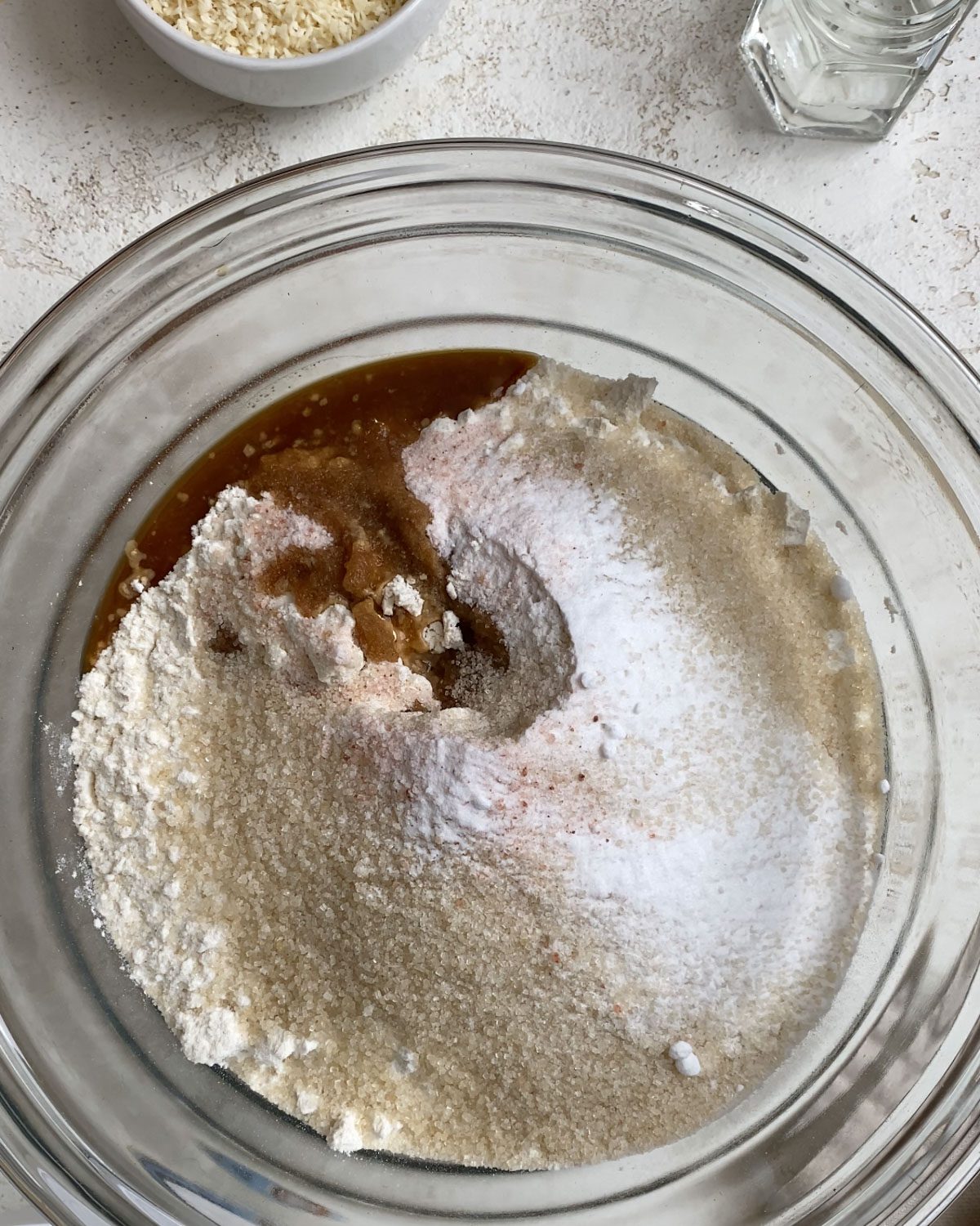 process shot of vanilla added to glass bowl