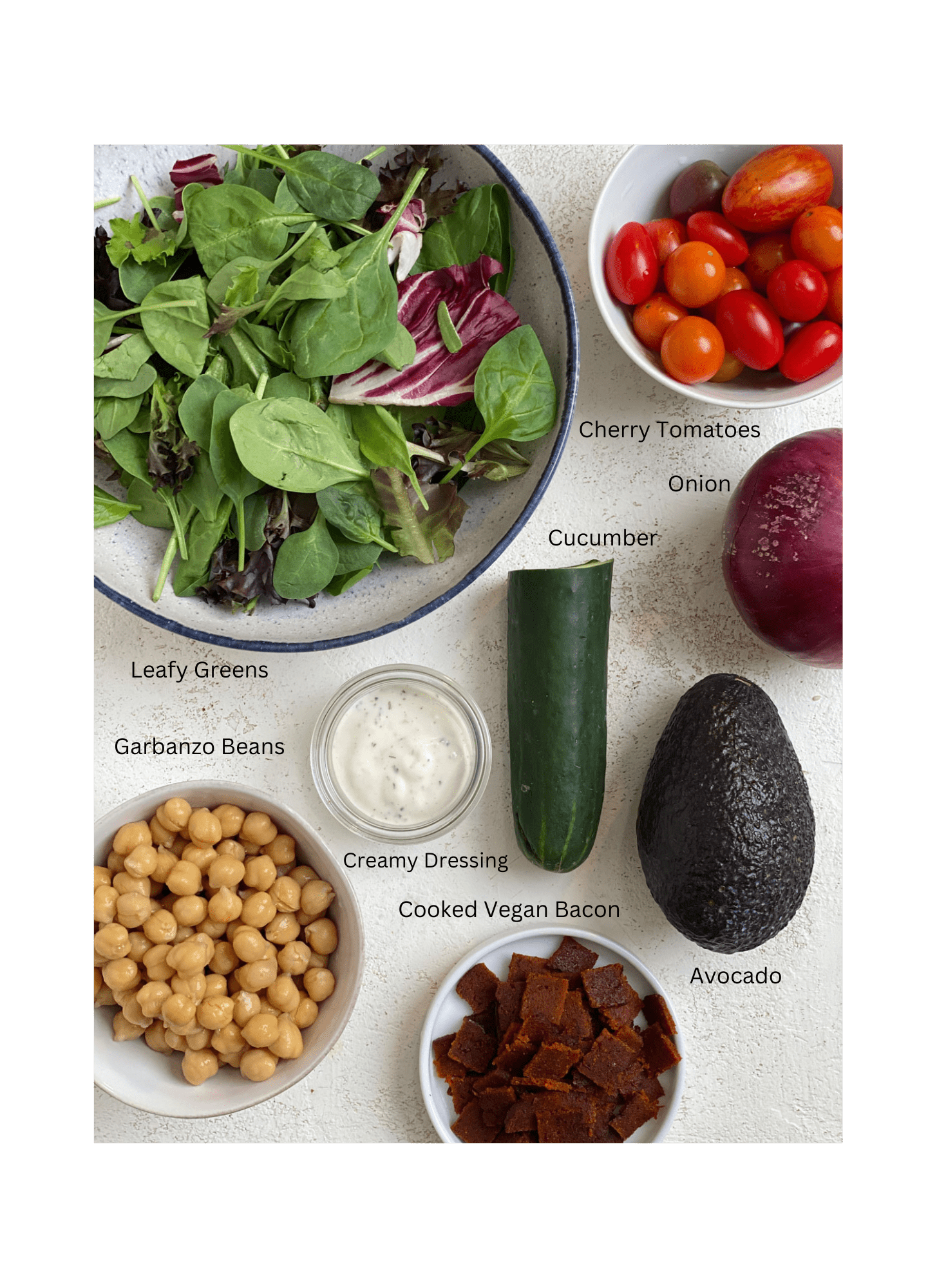 ingredients for Vegan Cobb Salad measured out against a white surface