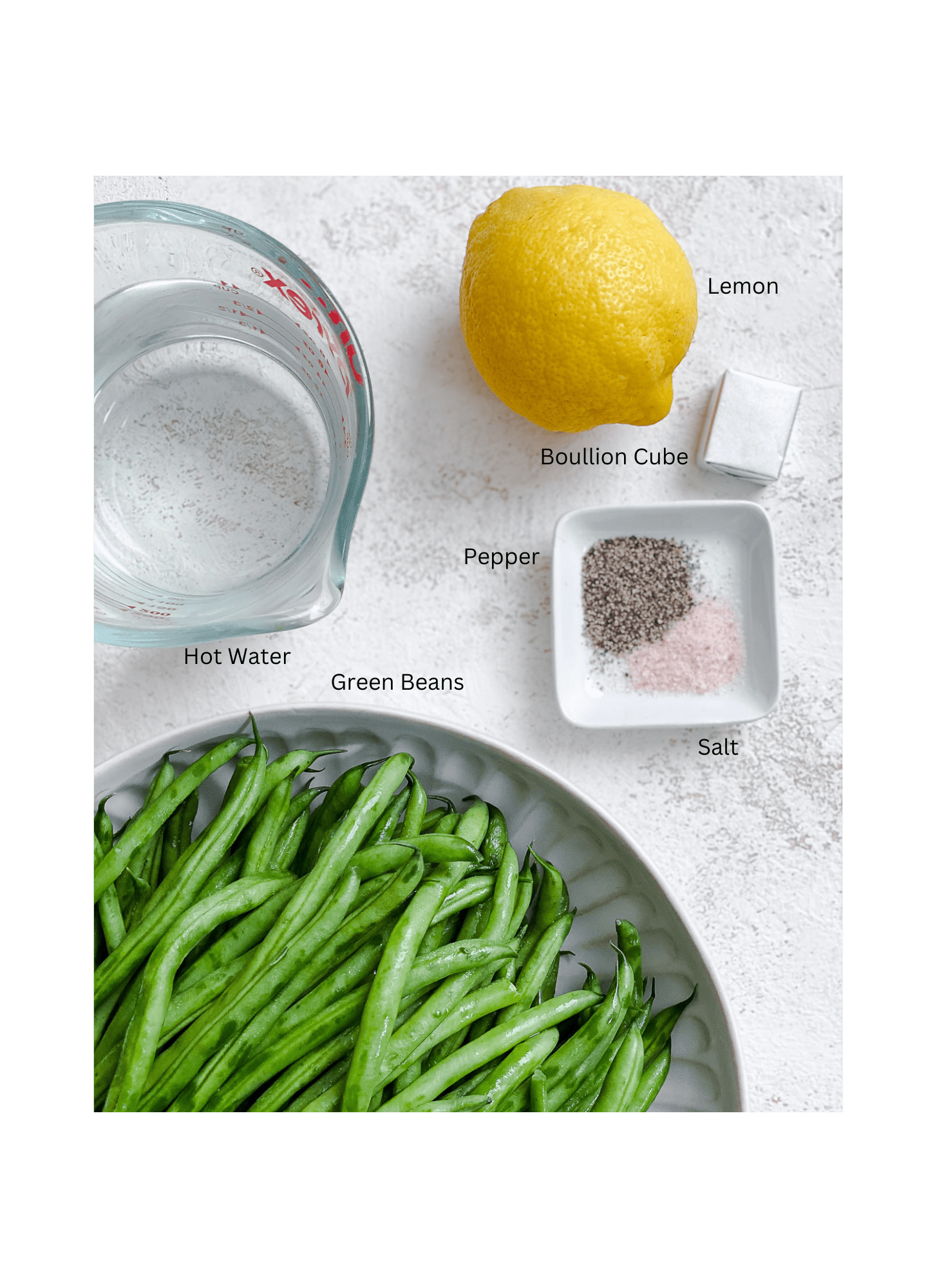 ingredients for Instant Pot Green Beans [Fresh or Frozen] measured out against a white surface