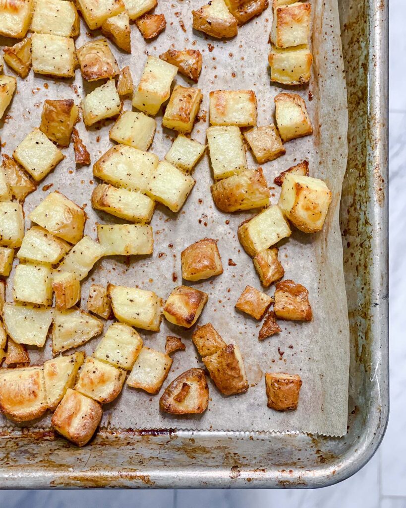 post baked potatoes on baking sheet