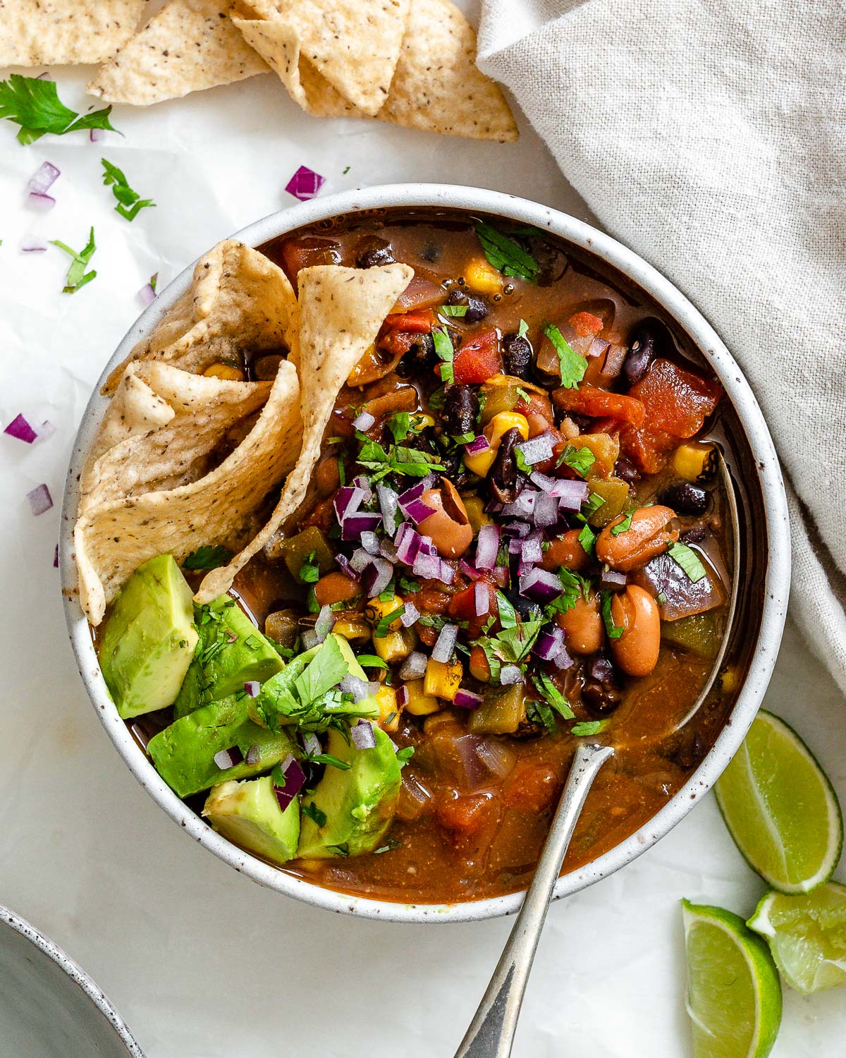 completed Easy Vegan Taco Soup in a bowl against a light surface