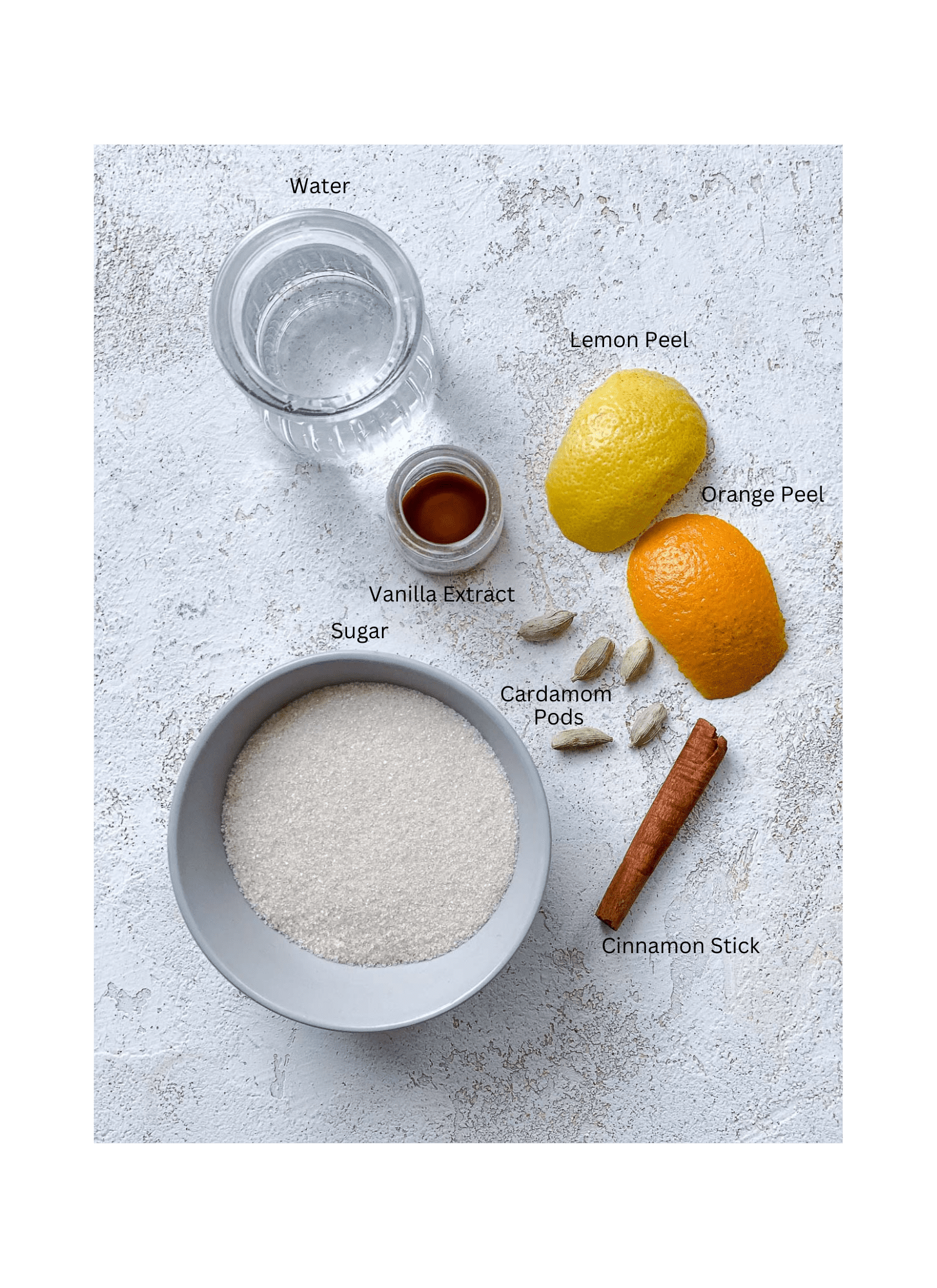 ingredients for Cardamom Syrup measured out against a white surface