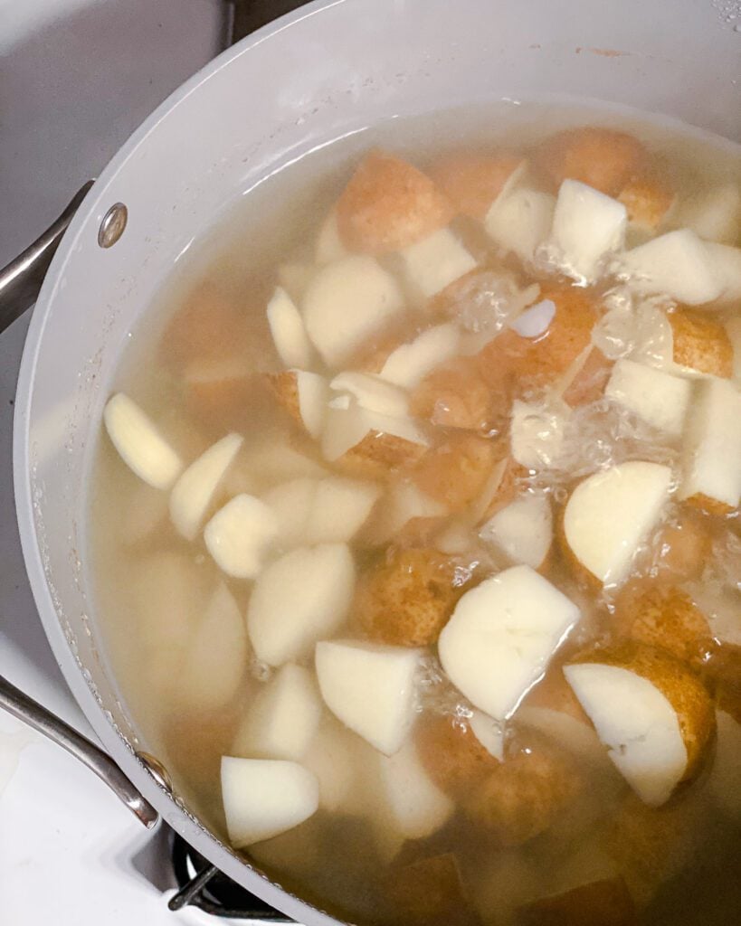 potatoes in a pot submerged in water