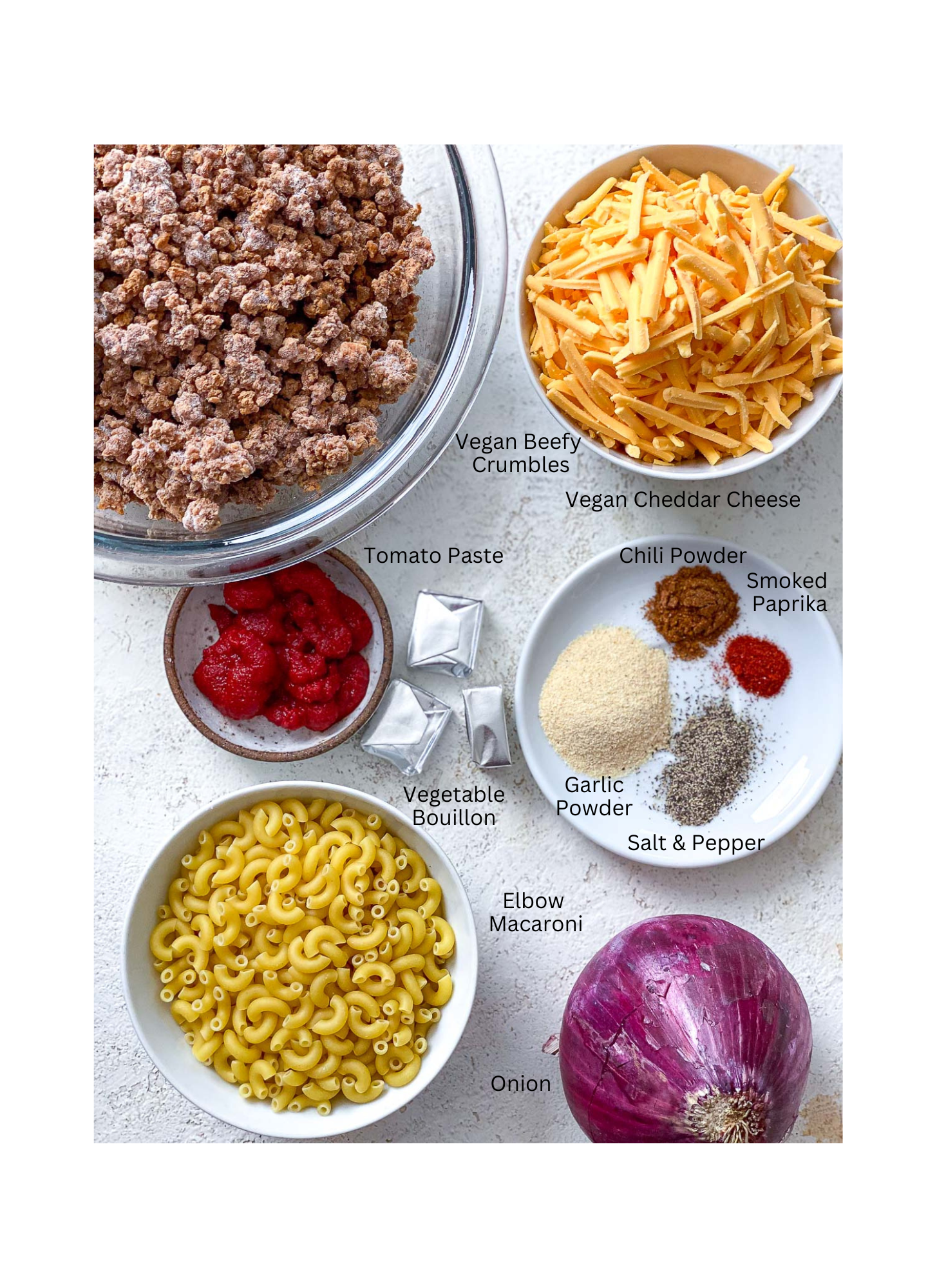 ingredients for One-Pot Vegan Hamburger Helper measured out against a white surface