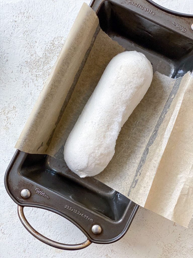 process shot showing bread in bread pan