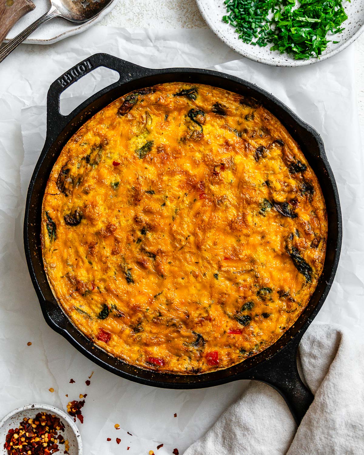 completed Vegan Just Egg Frittata in a skillet against a white surface