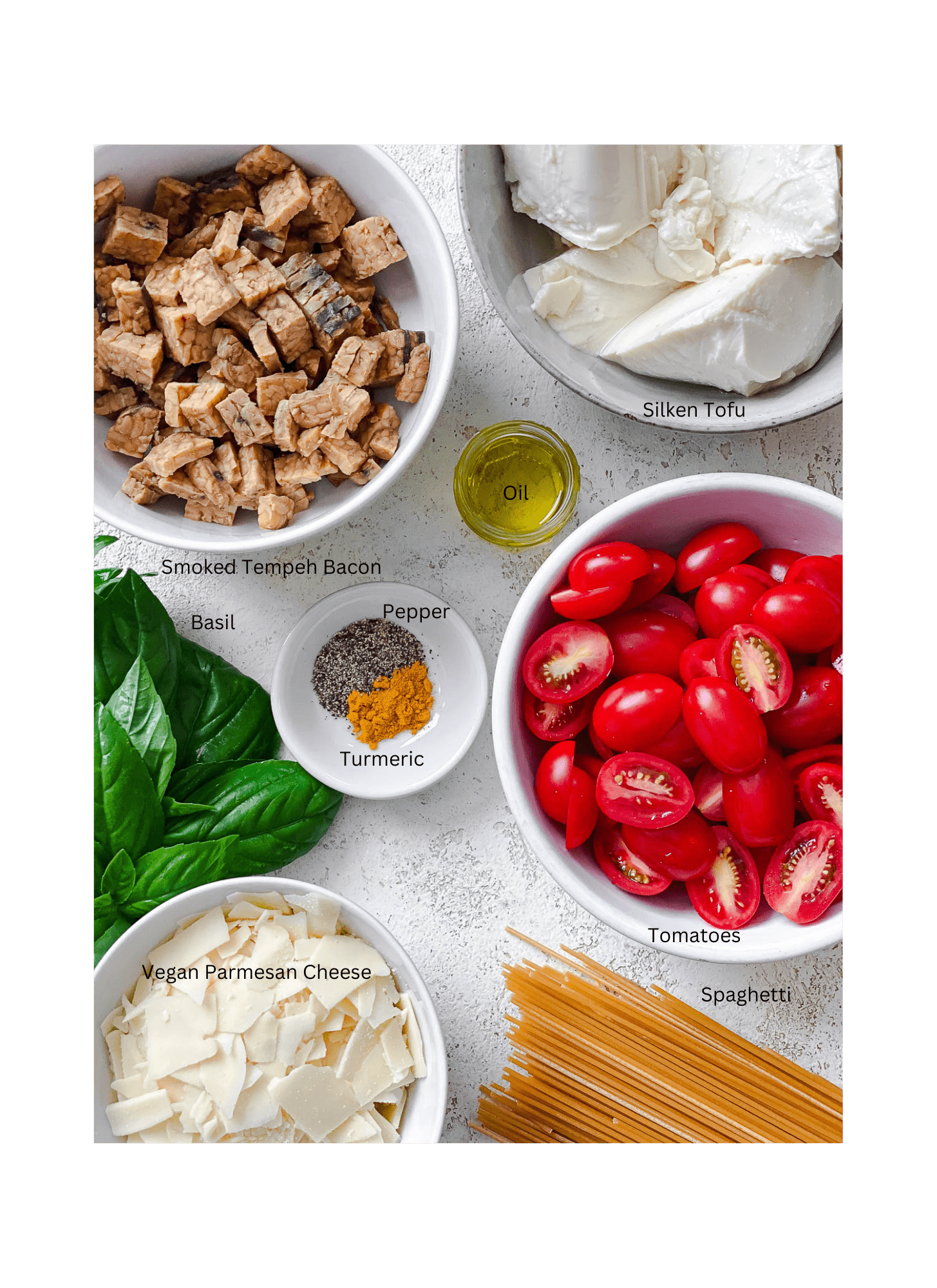 ingredients for Easy Vegan Carbonara measure out against a white surface