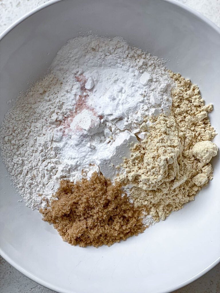 process shot of mixing dry ingredients together in a bowl