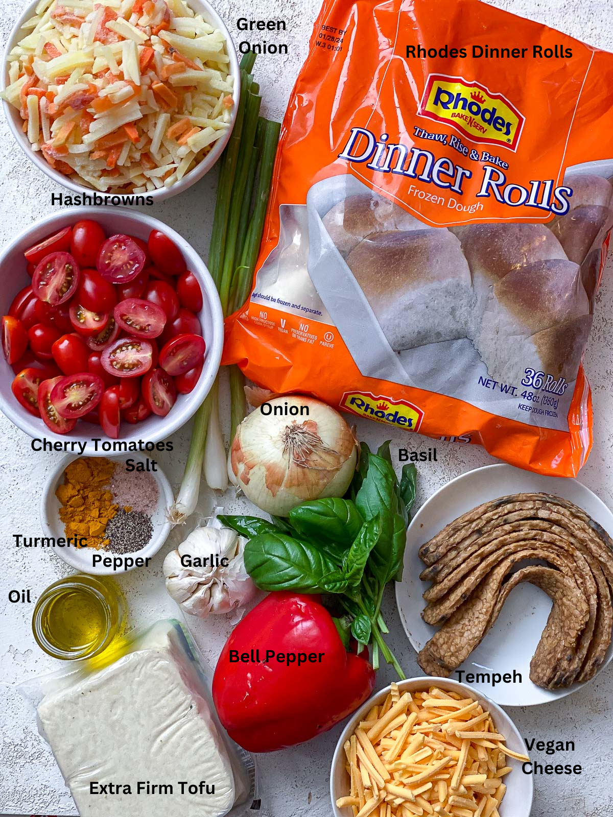 ingredients for Vegan Breakfast Pizza measured out on a white surface
