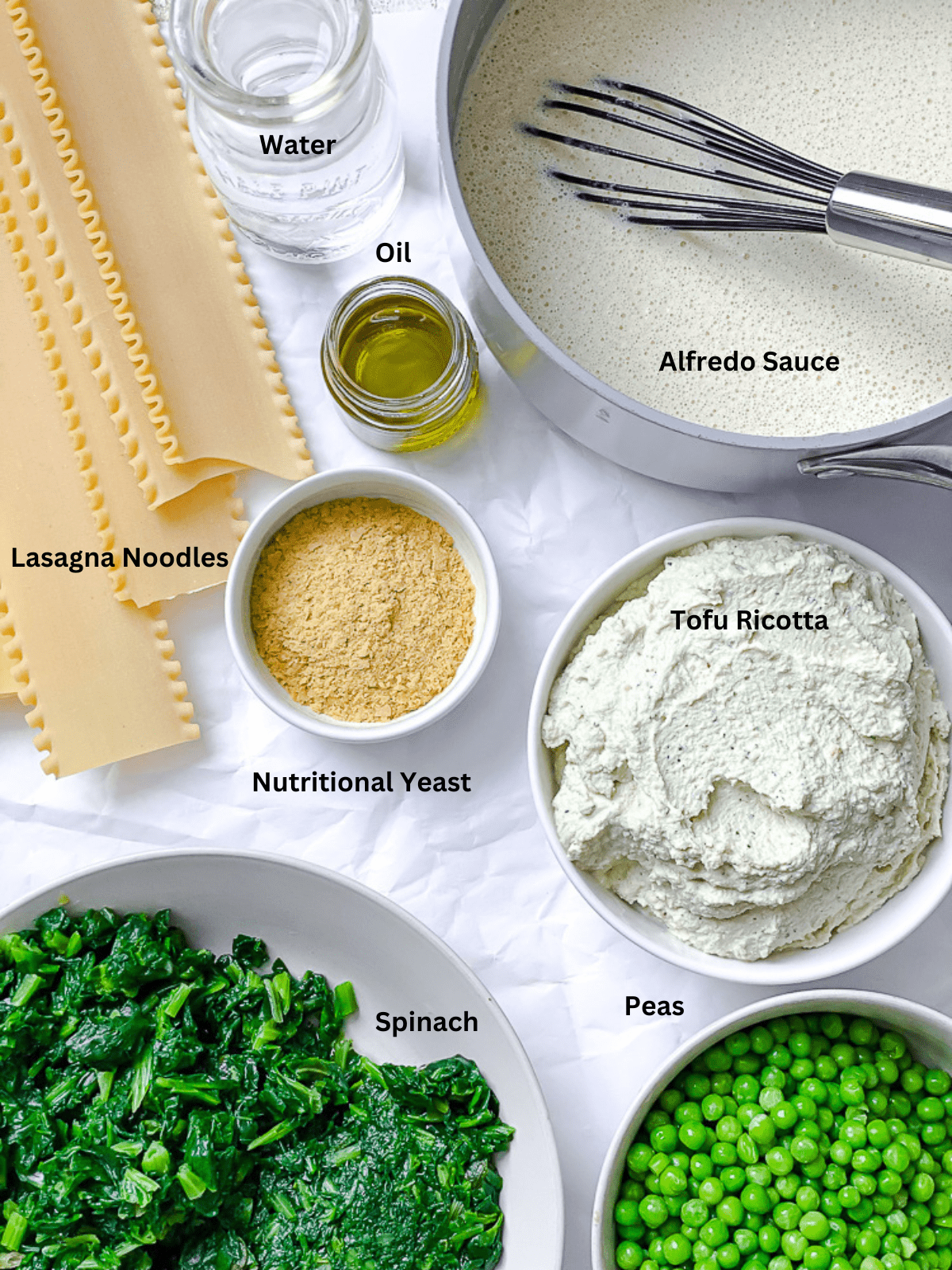 ingredients for Vegan White Lasagna measured out on a white surface

