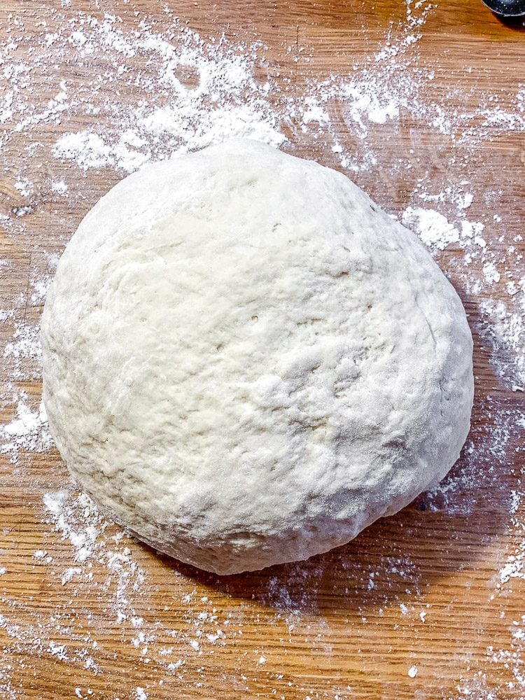 process shot showing dough ball on surface