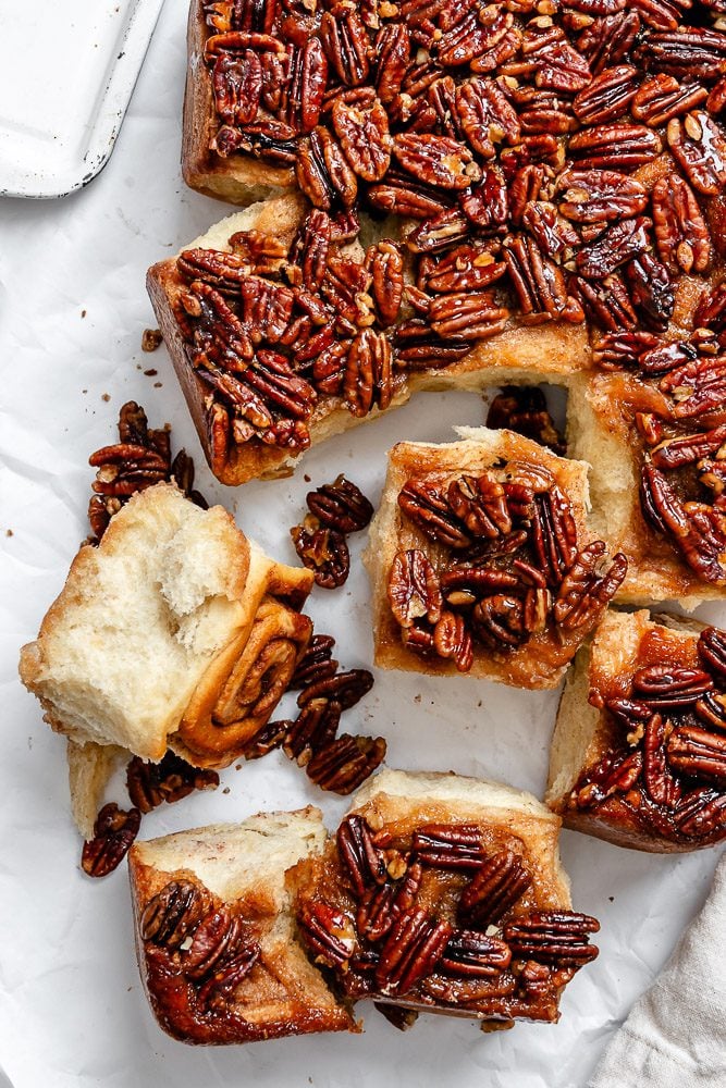 completed Pecan Cinnamon Sticky Buns on white surface