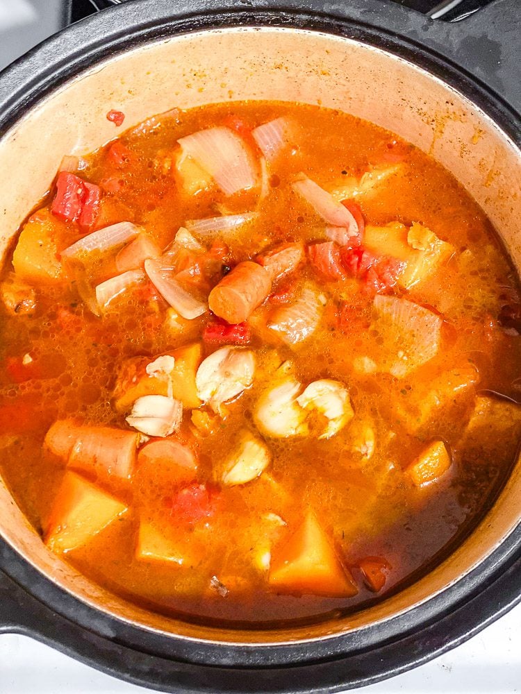 process shot showing soup cooking in pot