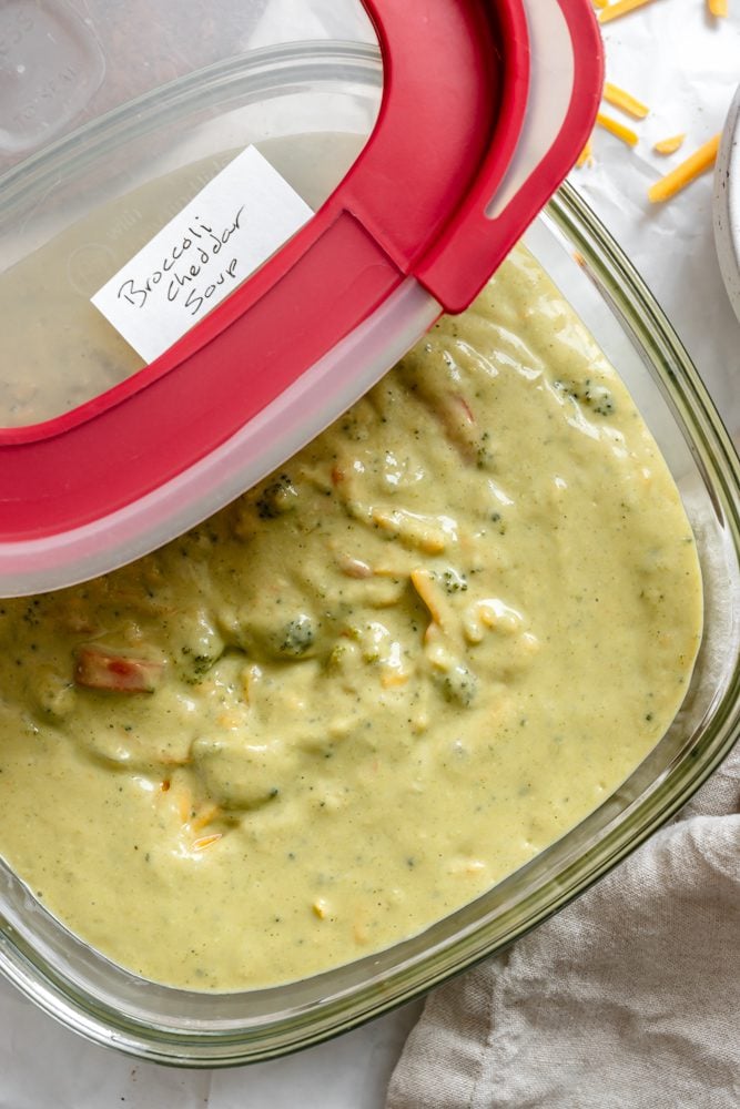 completed Vegan Broccoli Cheddar Soup in a storage container