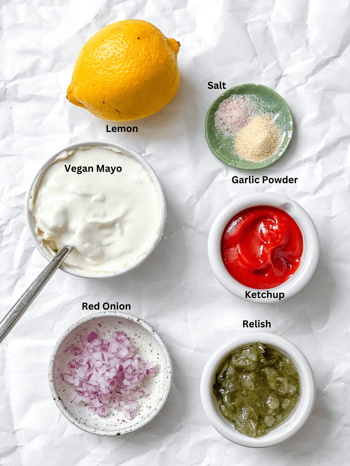 ingredients for Vegan Thousand Island Dressing measured out on a white surface