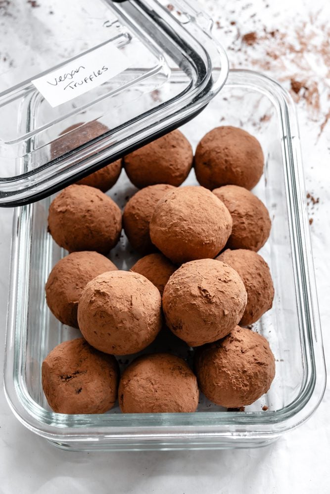 Completed Vegan Chocolate Truffles in a storage container.