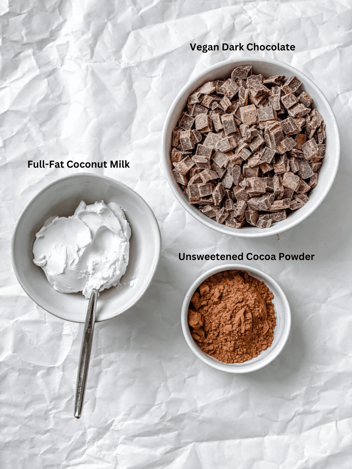 Ingredients for Vegan Chocolate Truffles measured out on a white surface.