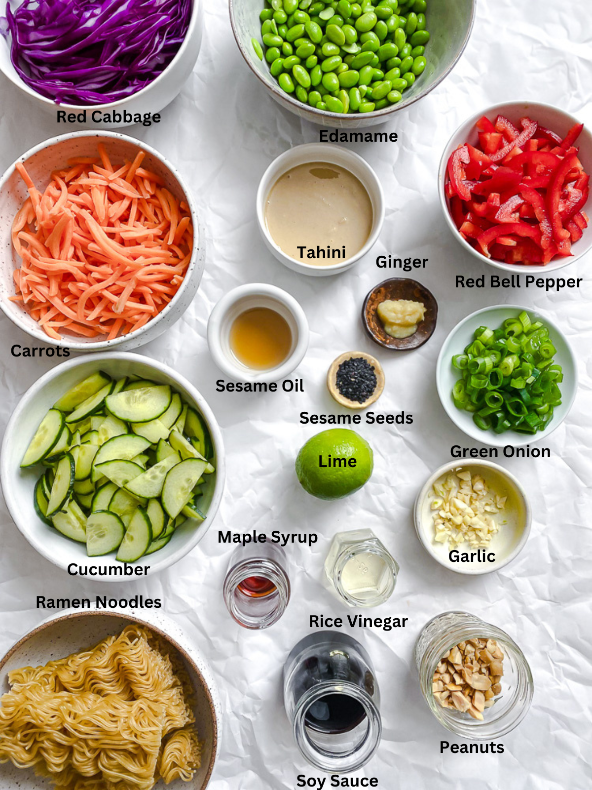 Ingredients for Cold Noodle Salad measured out on a white surface.