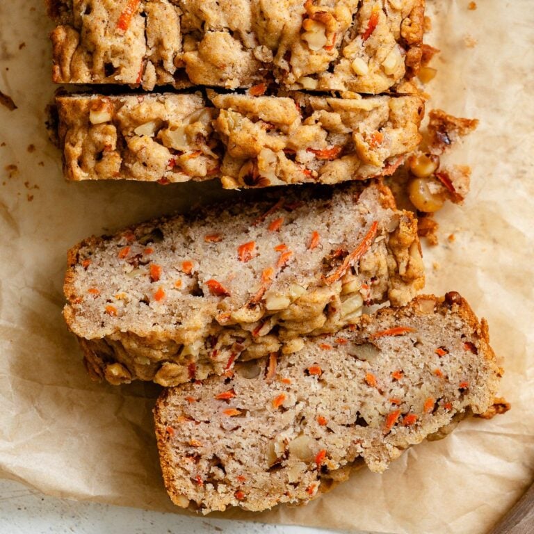Completed sliced Vegan Carrot Cake Loaf in loaf pan.