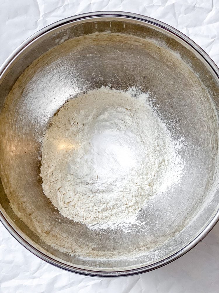 Process shot showing dry ingredients in a bowl.