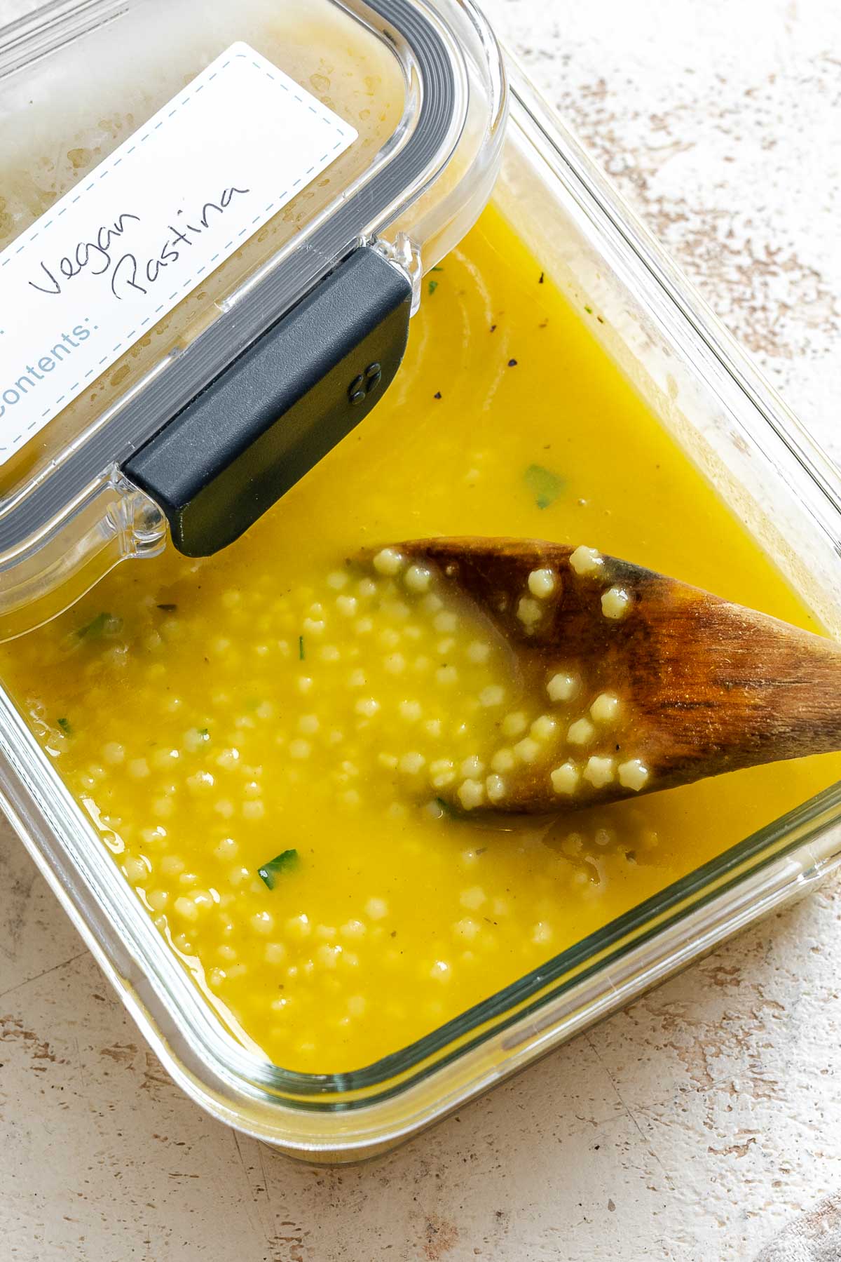 Completed Easy Pastina Recipe (Italian Penicillin Soup!) in a storage container.