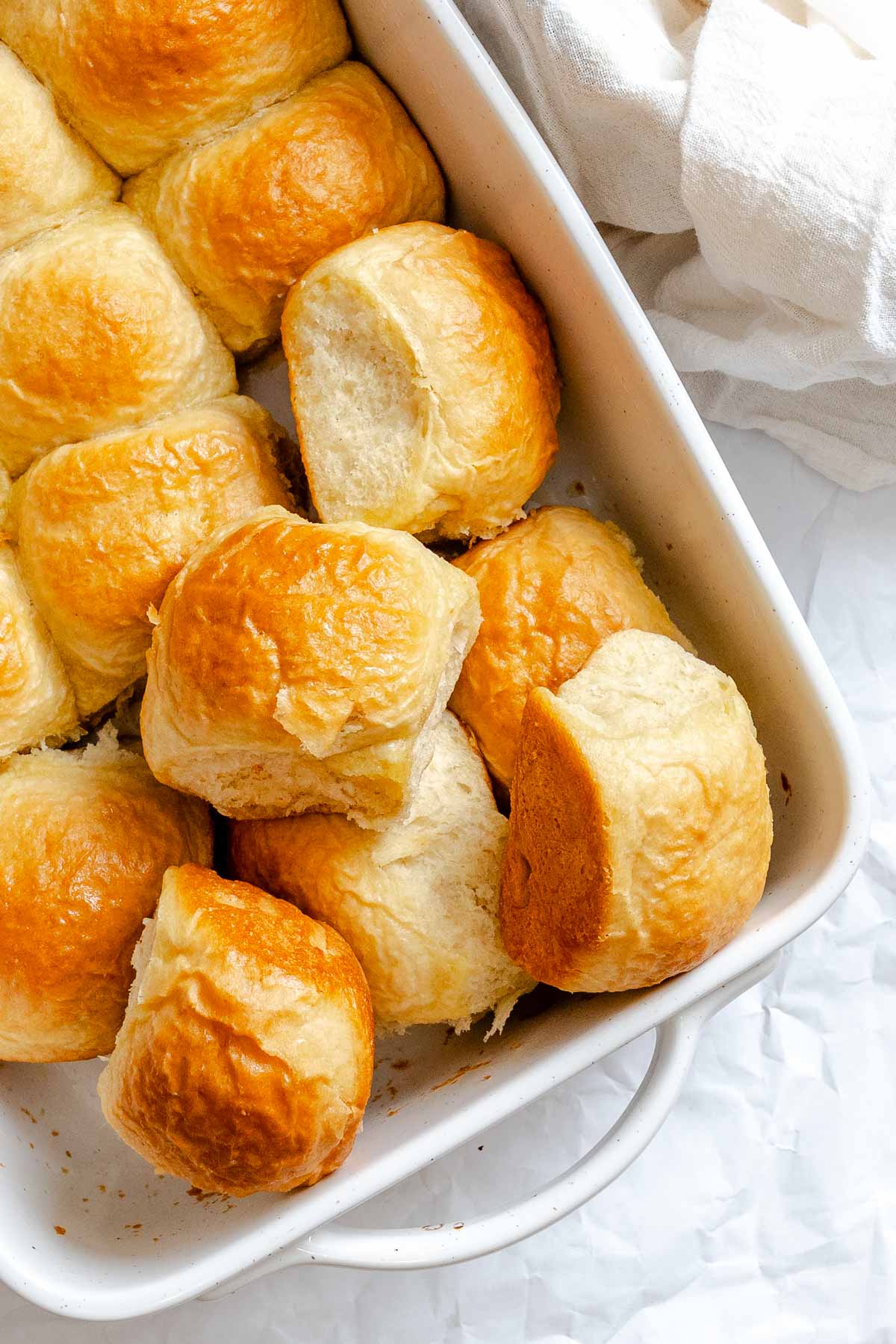 Completed Fluffy Vegan Dinner Rolls in baking dish.