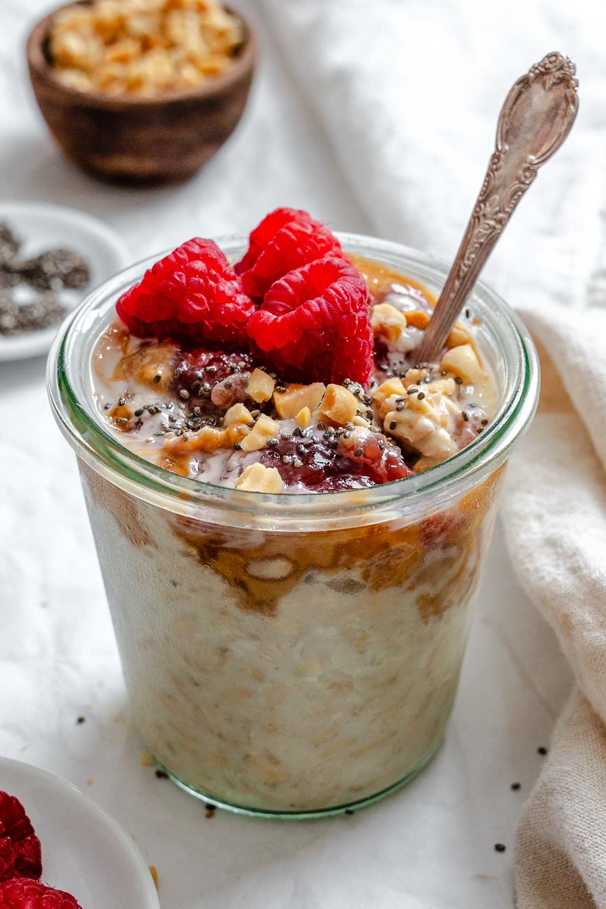 Completed Peanut Butter Jelly Overnight Oats in a jar.