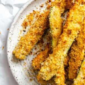 Completed Air Fryer Zucchini Fries on plate.