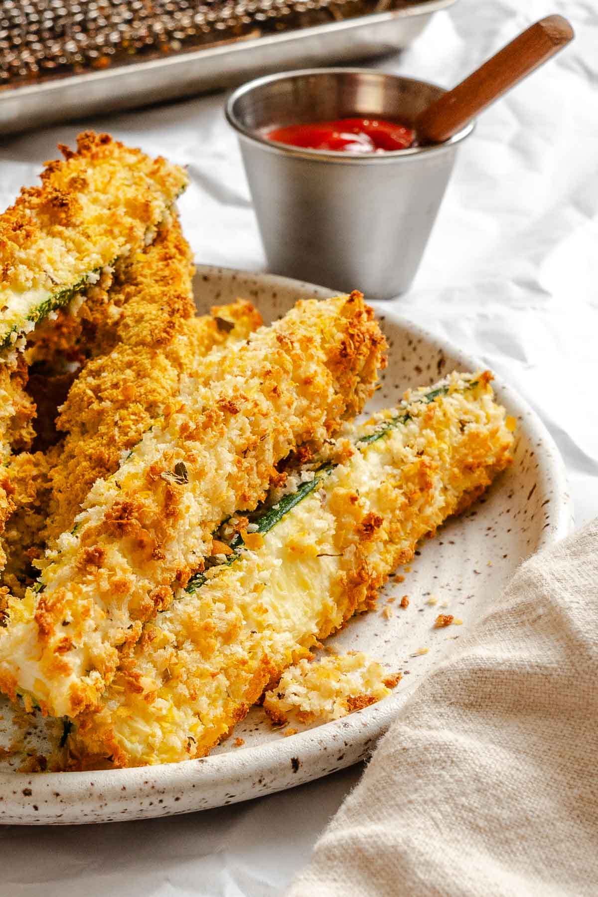 Completed Air Fryer Zucchini Fries on plate.