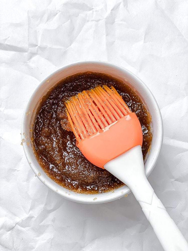 Process shot showing mixing ingredients in a small bowl.