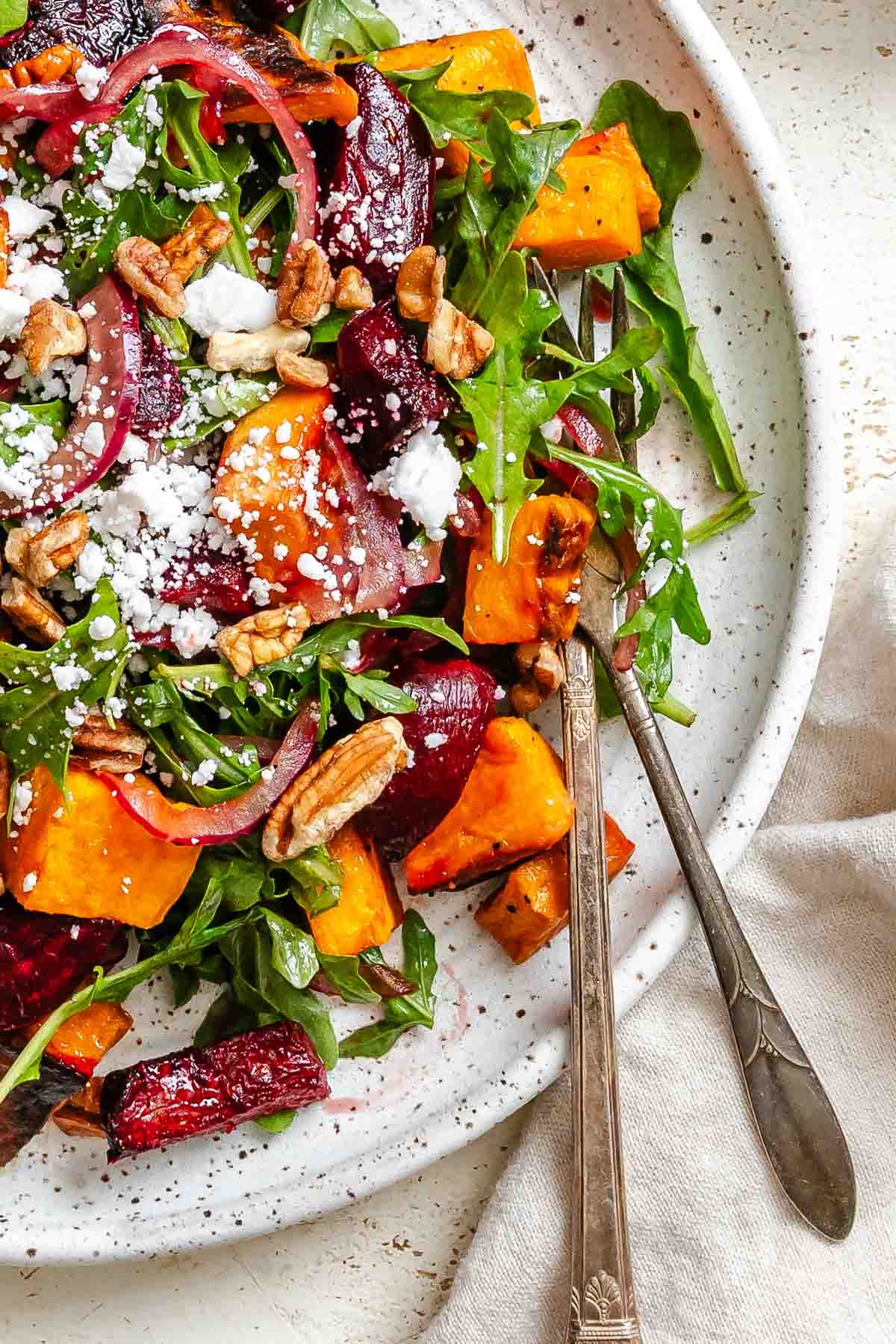 Completed Roasted Beetroot Sweet Potato Salad on a plate.