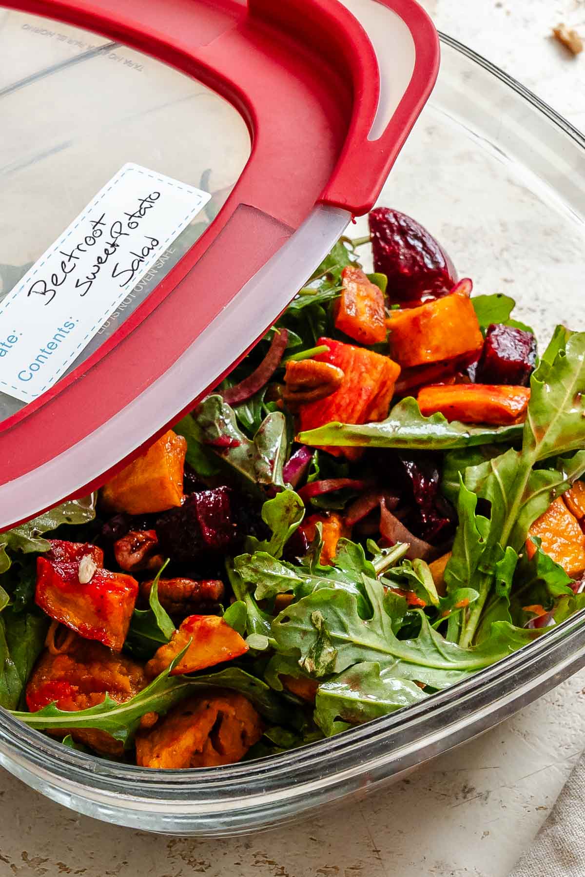 Completed Roasted Beetroot Sweet Potato Salad in a storage container.